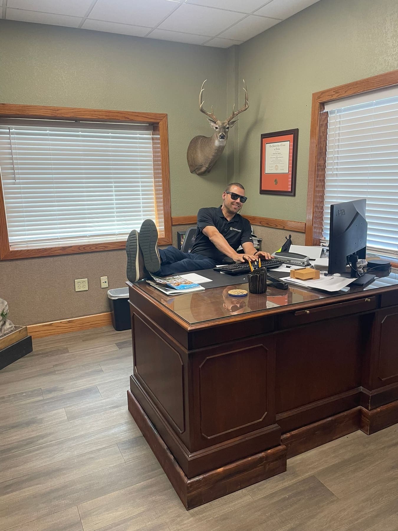 A Toolbx team member working out of a dealer's back office