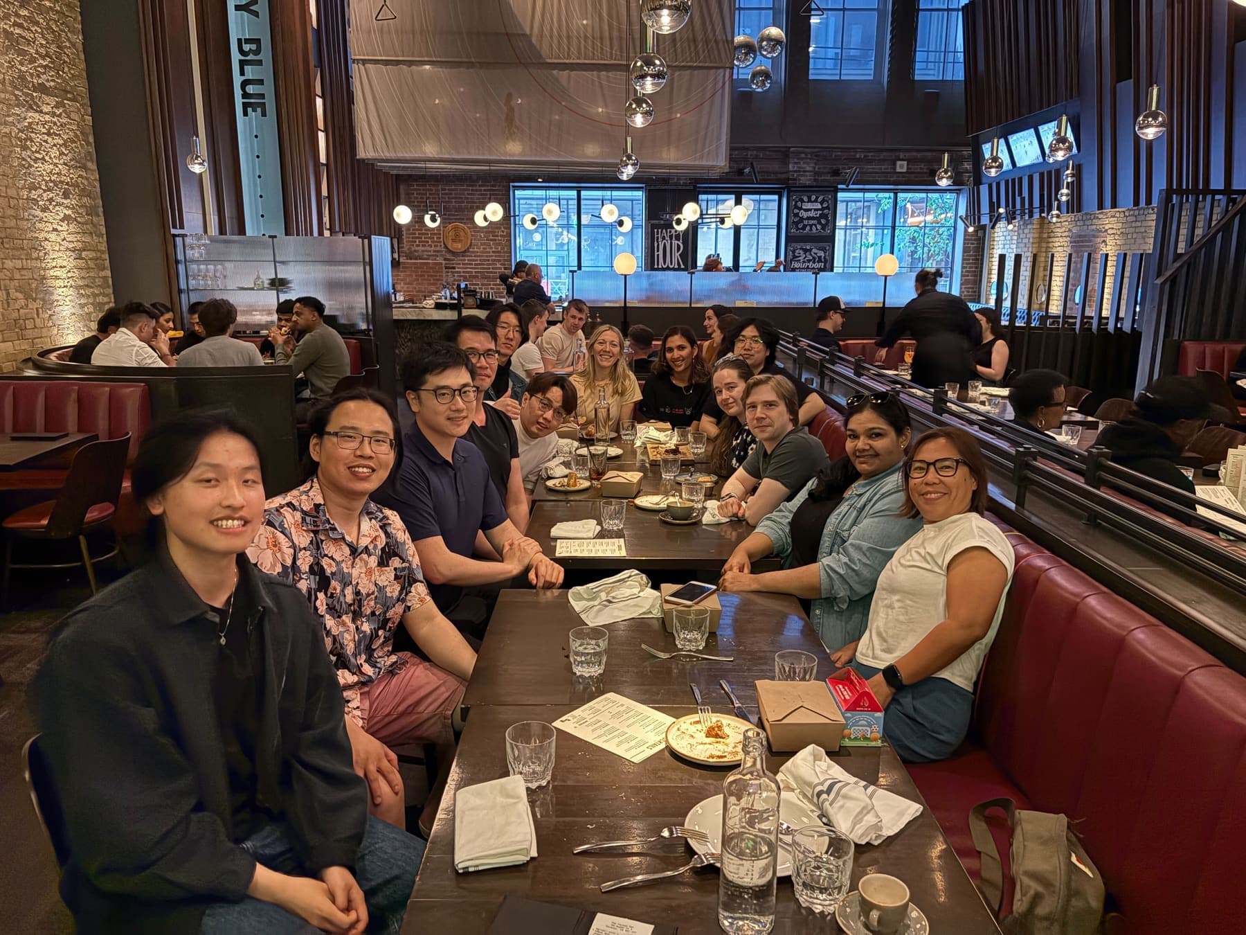 The Toolbx team around one long table at a team dinner