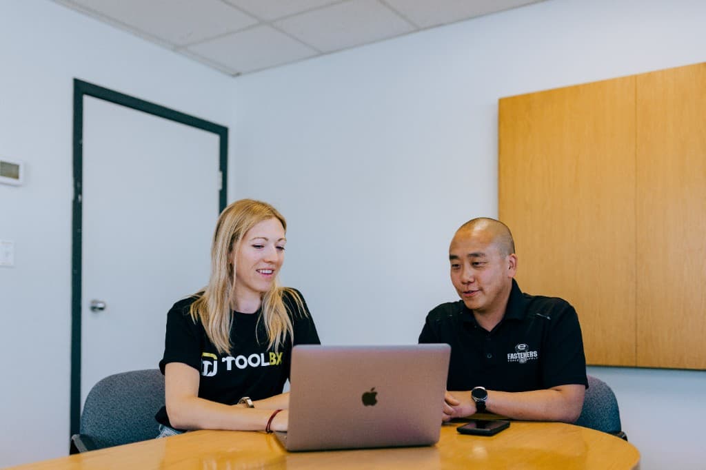 A Dealer team working on one system.